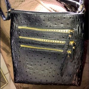 Black w/ gold zippers/white-black plaid interior